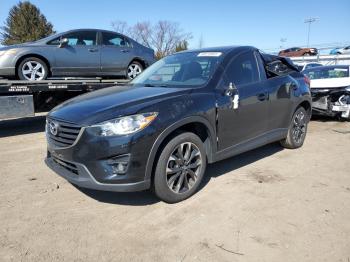  Salvage Mazda Cx